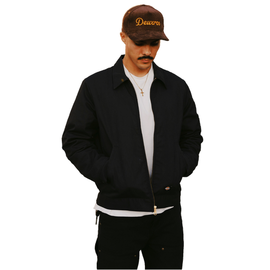deuXros brown corduroy hat men’s full body lifestyle shot, mid-profile soft crown, adjustable strap closure