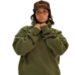 deuXros field moss hoodie women's lifestyle shot, oversized relaxed fit with drop shoulders, styled with deuXros corduroy hat
