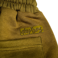  deuXros field moss sweatpants waistband and logo close-up, elastic waistband, back pocket detail