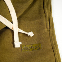 deuXros fieldmoss sweatpants logo detail, tonal matte 3d rubberized deuXros box logo, heavyweight fleece