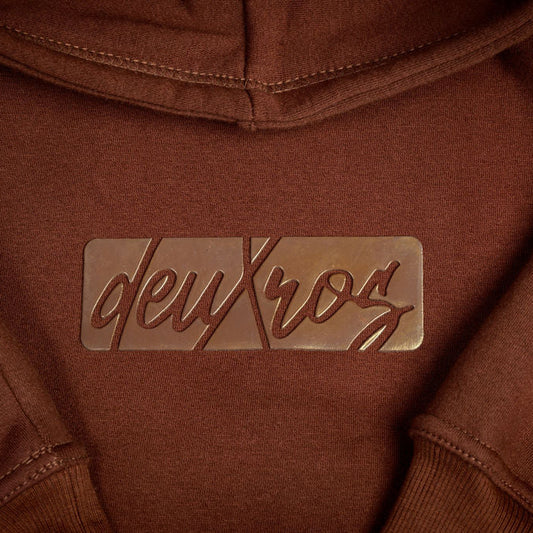 Color: Plumwood hoodie tonal matte 3d rubberized box logo close-up detail, 420 gsm heavyweight fleece