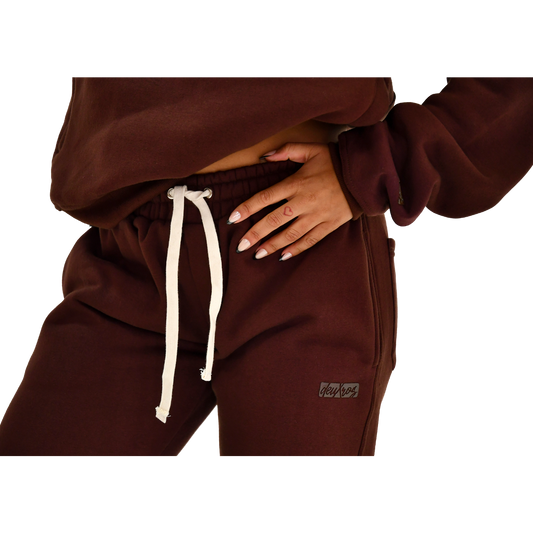 Color: Plumwood sweatpants waistband and logo detail, elastic drawcord, tonal matte 3d rubberized box logo