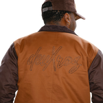 deuXros brown canvas jacket back embroidery detail, tonal script logo, two-tone construction with contrast sleeves
