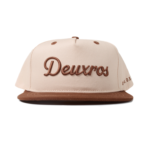 deuXros cream brown snapback ghost front view, embroidered script logo, contrast brown brim, mid-profile structured crown