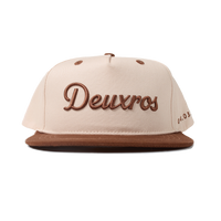 deuXros cream brown snapback ghost front view, embroidered script logo, contrast brown brim, mid-profile structured crown