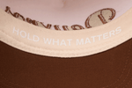 deuXros snapback hold what matters headband interior detail, cream and brown colorway